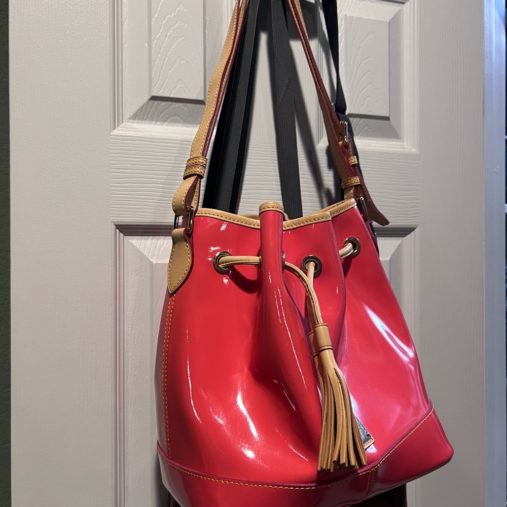 Dooney Bourke coral/melon/pink Patent Leather Bucket Bag with Tan leather trim